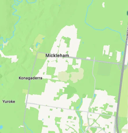 Map showing Mickleham, Konagaderra, and Yuroke areas in a green landscape. Roads and terrains are highlighted with clear white paths.