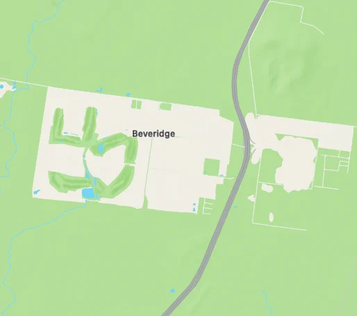 Map showing Beveridge with green land areas, a central road, and water bodies. The mood is neutral with no visible human activity.