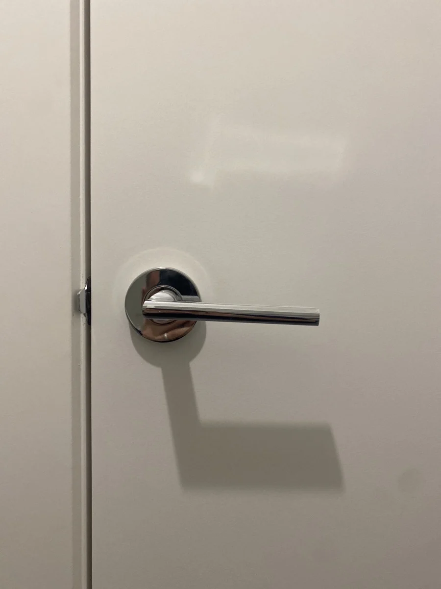 Door not closing properly due to out of level door handle