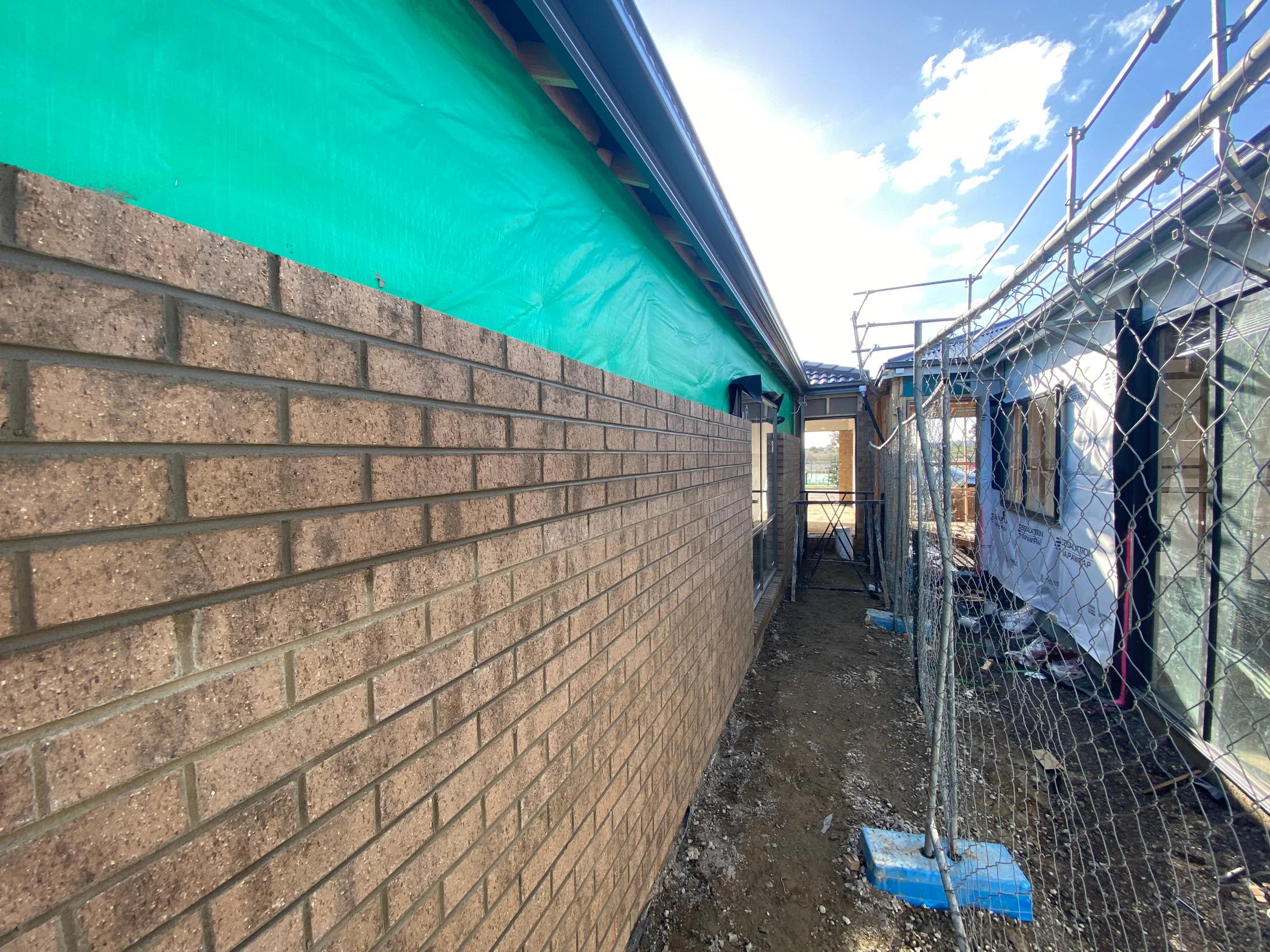 A brick wall under construction