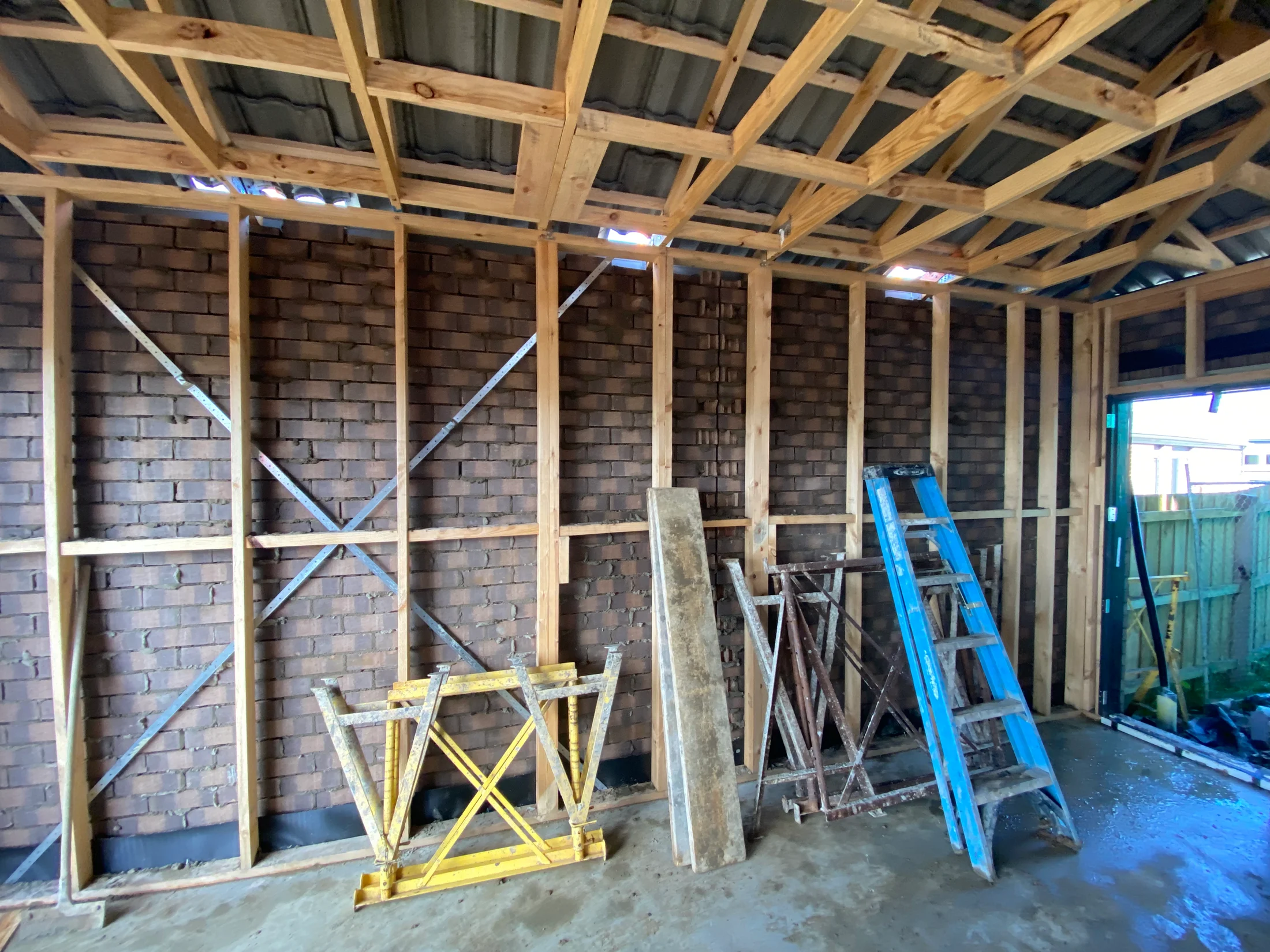 Internal side of a garage brick wall in new home construction