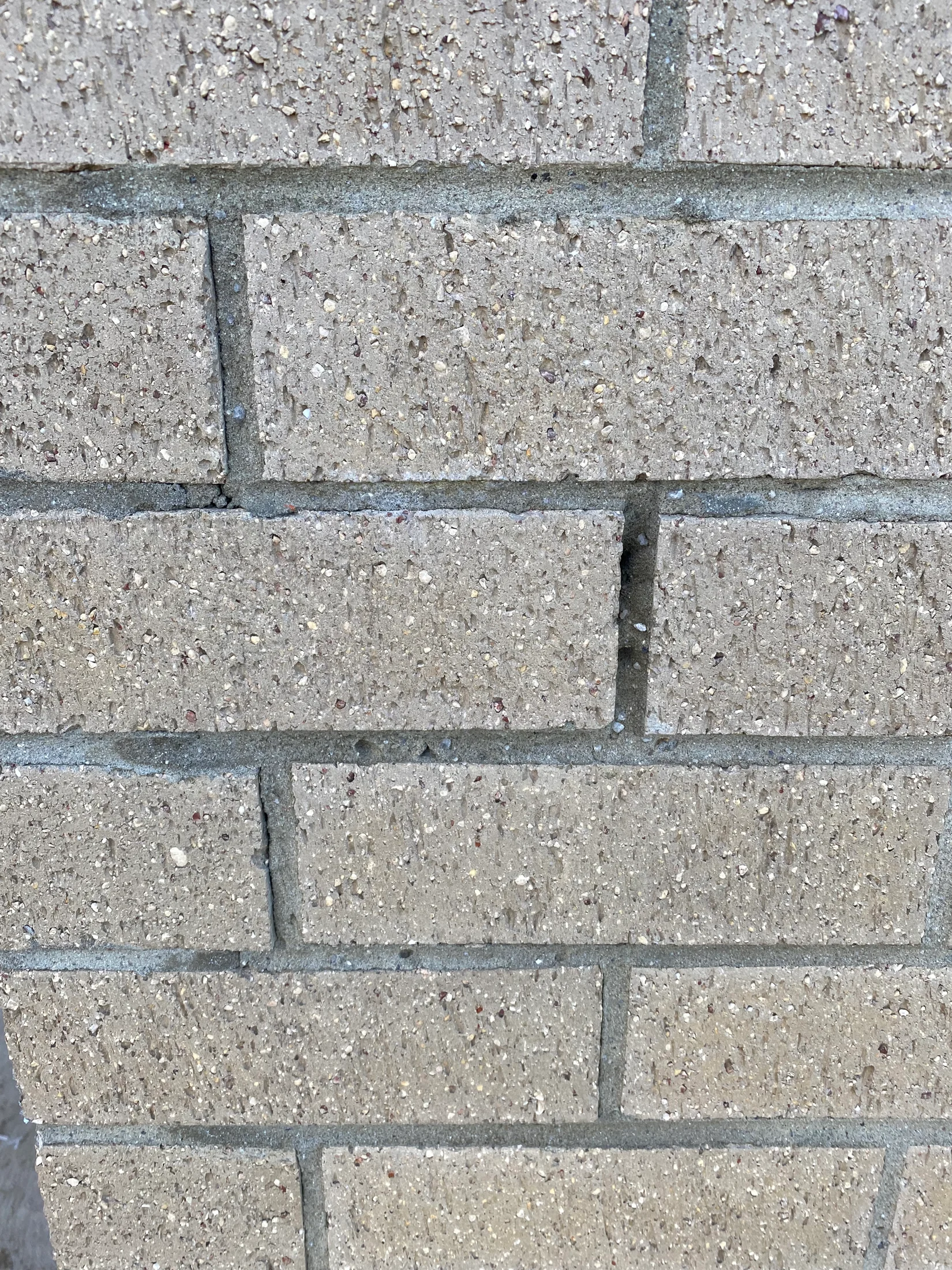 Bricks and mortar, which is degrading and cracking