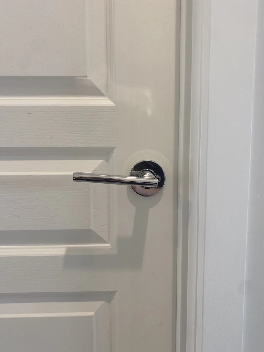 Door not closing properly due to out of level door handle