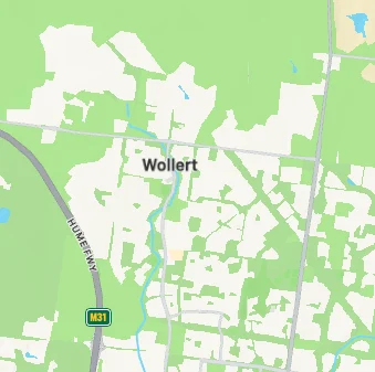 Map view of Wollert with green and white areas indicating land and buildings. Visible roads include Hume Freeway (M31).