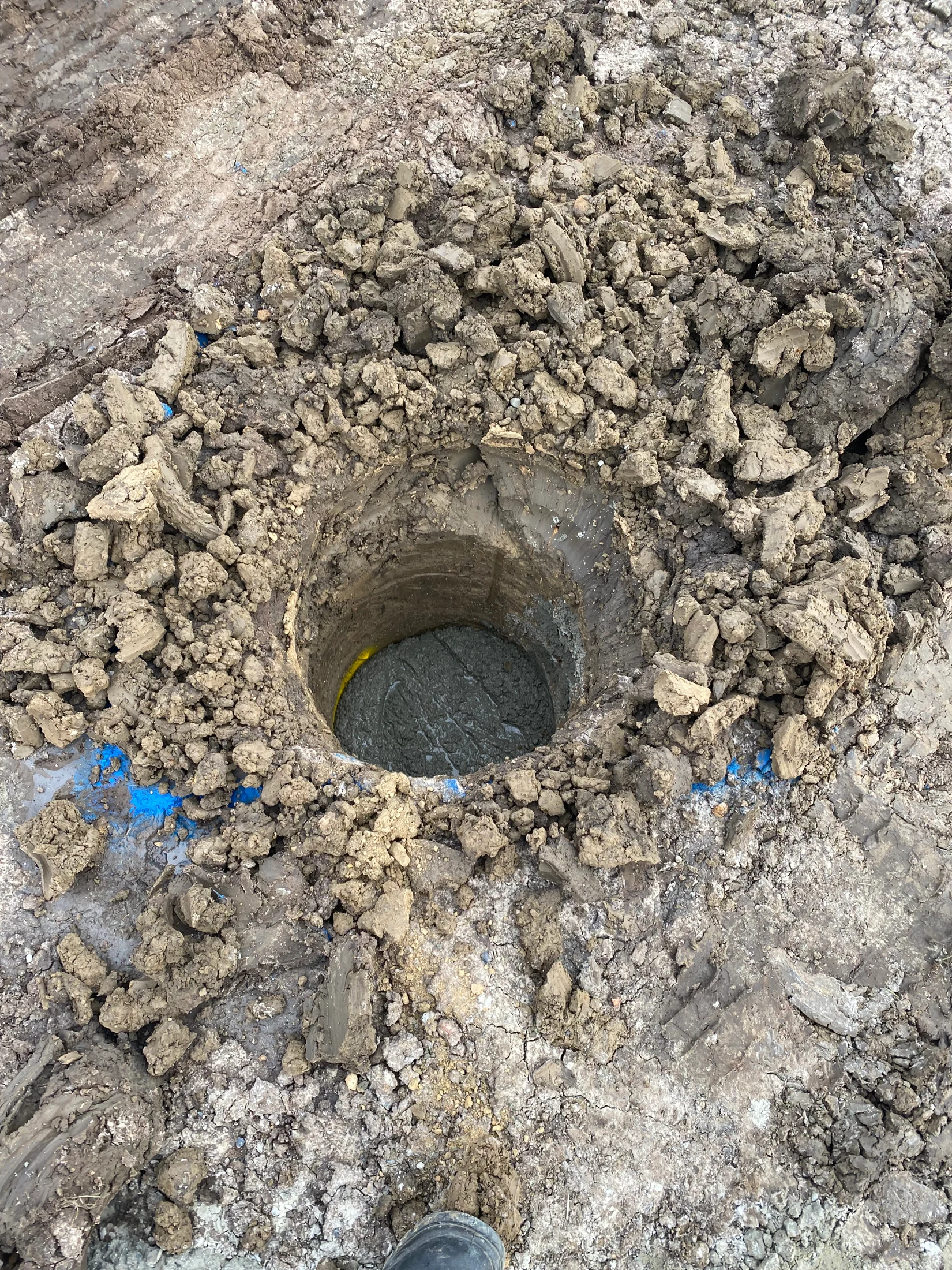 A pier hole, drilled out ready for the bored pier to be filled with concrete at pre-base stage